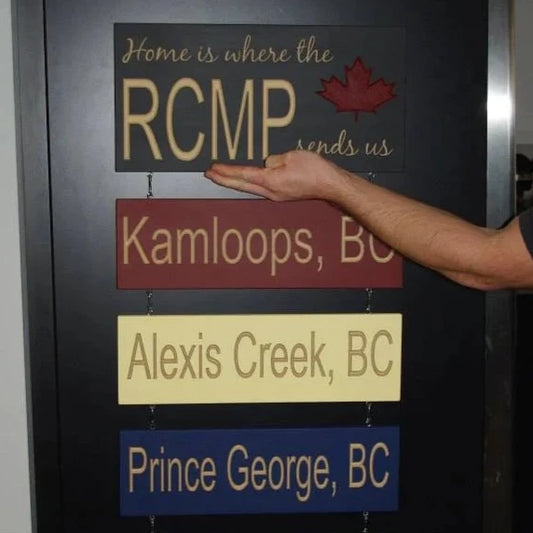 Home is where the RCMP sends us - Main Sign